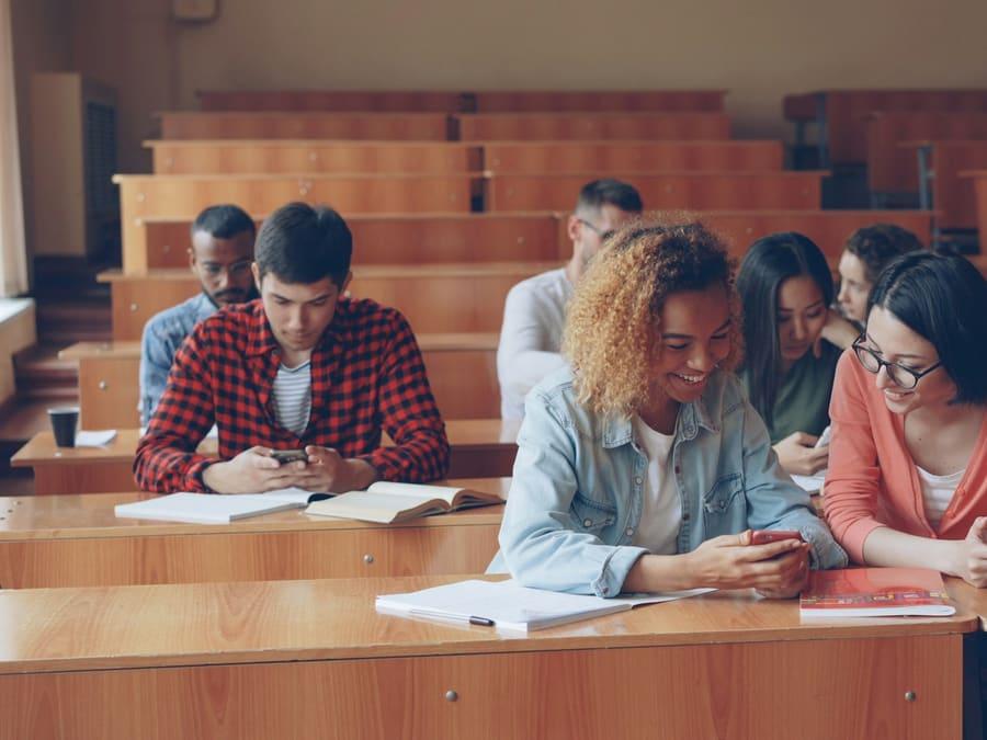 Students studying together in a lecture hall